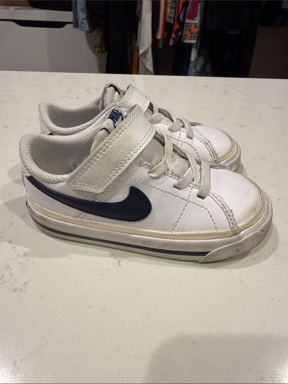 Nike Kids White Sneakers with Navy Swoosh and Velcro Strap